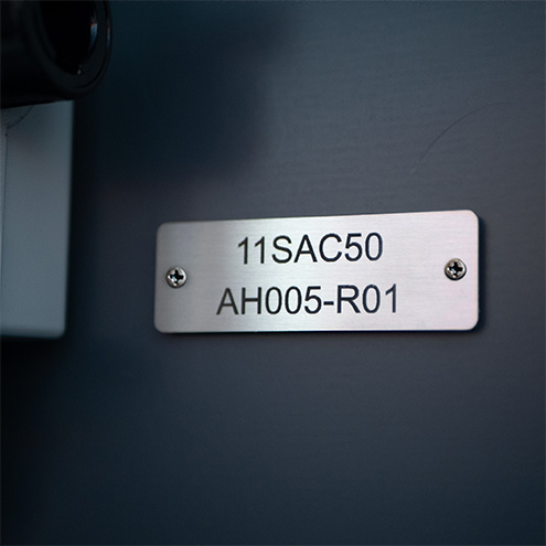 Stainless Steel Sign on Wall